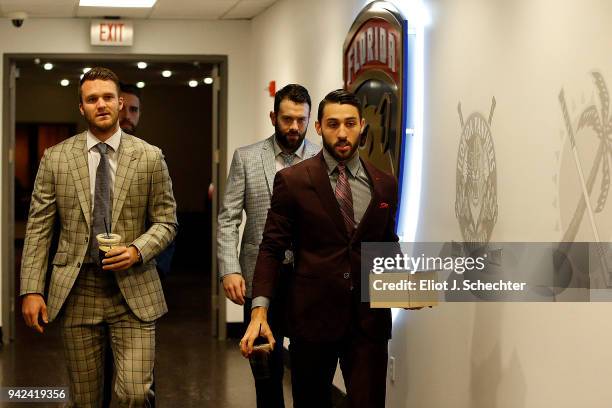 Jonathan Huberdeau of the Florida Panthers arrive with teammates Vincent Trocheck, Keith Yandle and Aaron Ekblad for tonights game against the Boston...