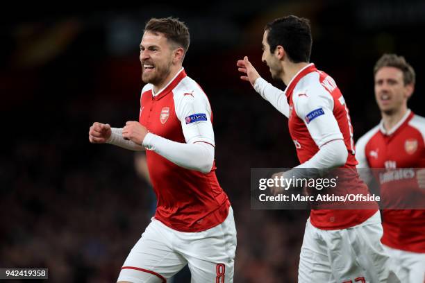 Aaron Ramsey of Arsenal celebrates with Henrikh Mkhitaryan during the UEFA Europa League quarter final leg one match between Arsenal FC and CSKA...