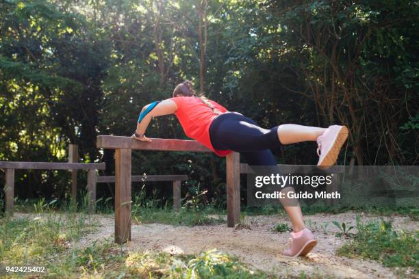 woman doing sport outdoor. - longeville sur mer stock pictures, royalty-free photos & images