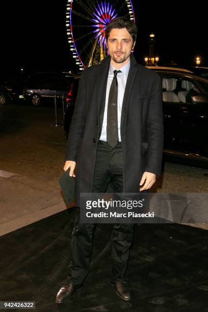 Actor Raphael Personnaz arrives to attend the 'Madame Figaro' dinner at Automobile Club de France on April 5, 2018 in Paris, France.