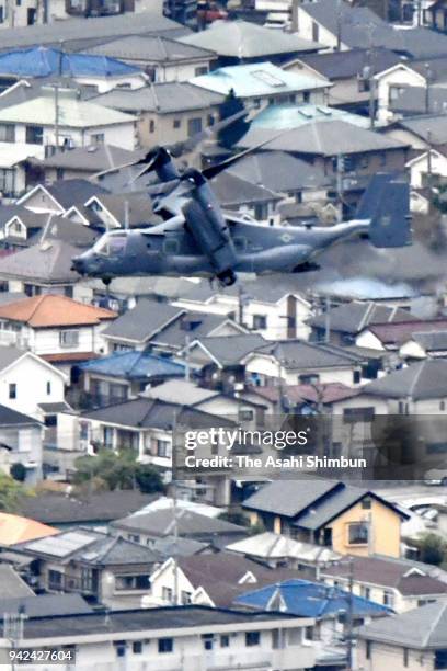 Osprey flies past Mresidential district near the U.S. Yokota Air Base on April 5, 2018 in Fussa, Tokyo, Japan. The transport aircraft will be...