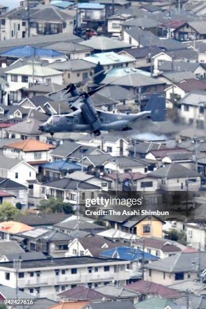 Osprey flies past Mresidential district near the U.S. Yokota Air Base on April 5, 2018 in Fussa, Tokyo, Japan. The transport aircraft will be...