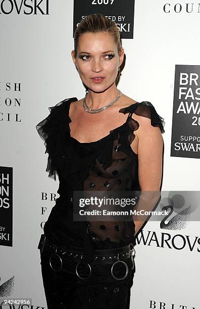 Kate Moss poses in the press room at the British Fashion Awards at Royal Courts of Justice, Strand on December 9, 2009 in London, England.