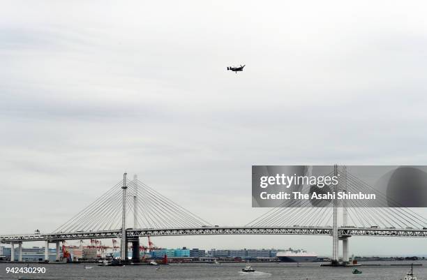 Osprey flies over Yokohama Bay Bridge on April 5, 2018 in Yokohama, Kanagawa, Japan. The transport aircraft will be deployed at Yokota Air Base more...