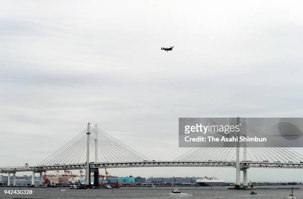 Osprey flies over Yokohama Bay Bridge on April 5, 2018 in Yokohama, Kanagawa, Japan. The transport aircraft will be deployed at Yokota Air Base more...