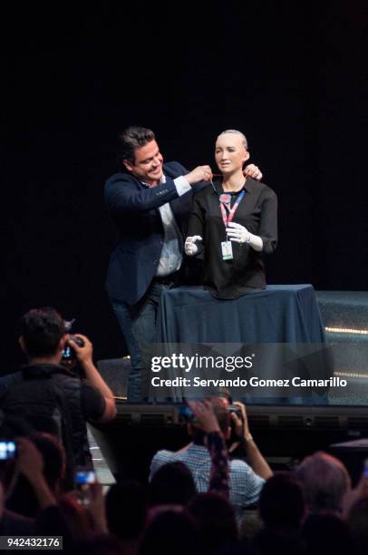 Aristoteles Sandoval Governor of Mexican State of Jalisco puts a necklace on robot Sophia during the Robot Sophia Master Conference as part of the...