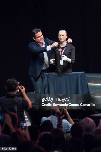 Aristoteles Sandoval Governor of Mexican State of Jalisco puts a necklace on robot Sophia during the Robot Sophia Master Conference as part of the...
