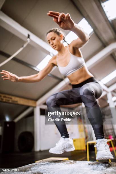 box jumping - squat jump stock pictures, royalty-free photos & images
