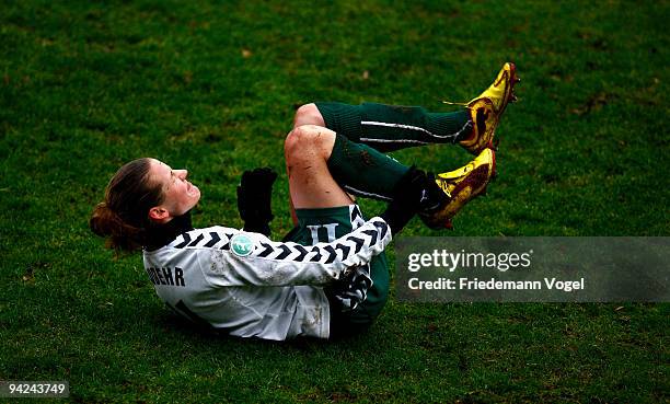 Simone Laudehr of Duisburg is injured during the Women's Bundesliga match between FCR 2001 Duisburg and FC Bayern Muenchen at the PCC stadium on...