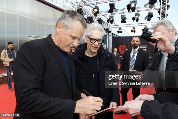 Director David Cronenberg and actor Viggo Mortensen sign autographs for fans as they attend 10th Beaune International Thriller Film Festival on April...