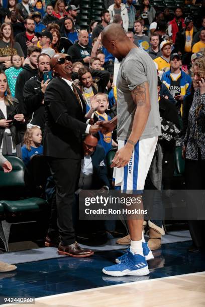 Hammer and David West of the Golden State Warriors chat before the game against the Indiana Pacers on April 5, 2018 at Bankers Life Fieldhouse in...