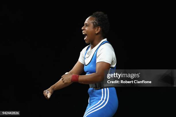 Mary Lifu of Solomon Islands celebrates during the Women's 53kg weightlifting final on day two of the Gold Coast 2018 Commonwealth Games at Carrara...