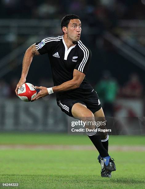 Zar Lawrence of New Zealand runs with the ball during the IRB Sevens tournament at the Dubai Sevens Stadium on December 5, 2009 in Dubai, United Arab...