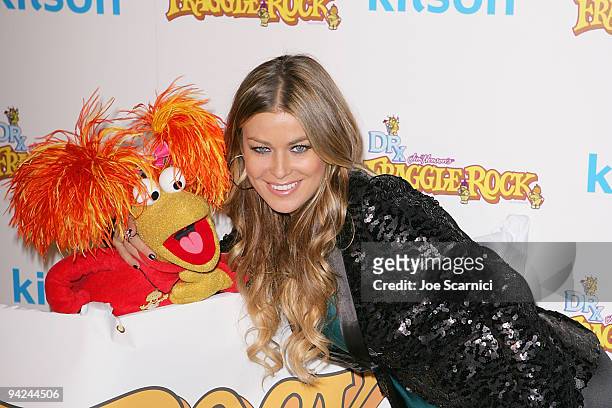 Carmen Electra arrives at the Jim Henson Company's "Fraggle Rock" Holiday Toy Drive Benefit at Kitson on Robertson on December 9, 2009 in Beverly...