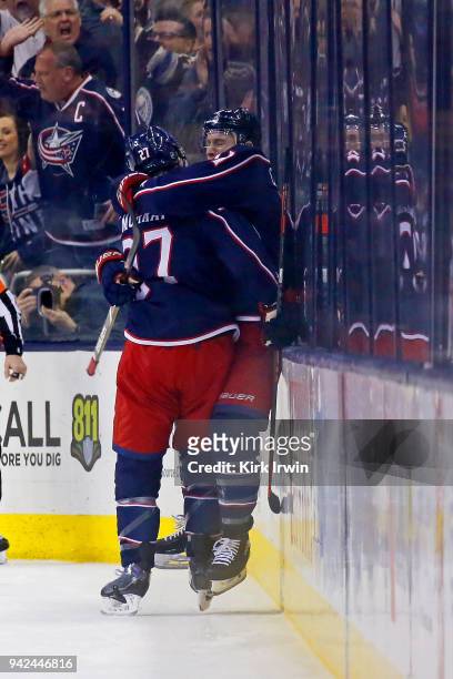 Ryan Murray of the Columbus Blue Jackets congratulates Matt Calvert of the Columbus Blue Jackets after scoring a goal during the first period of the...