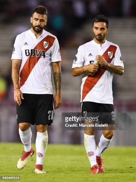 Lucas Pratto and Ignacio Scocco of River Plate leave the field after Copa CONMEBOL Libertadores match between River Plate and Independiente Santa Fe...