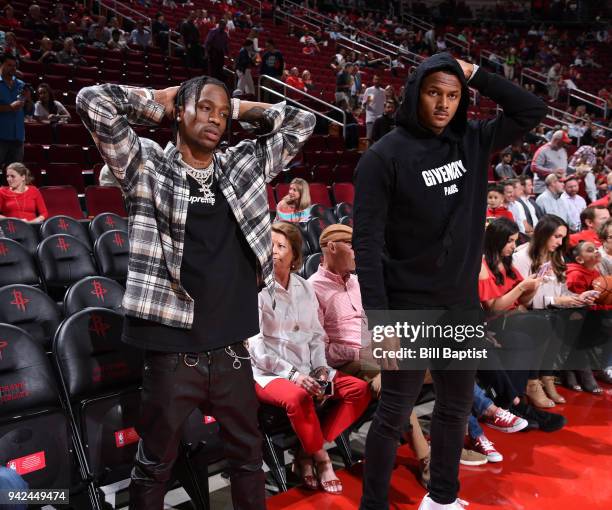 Travis Scott and Deshaun Watson before the game between the Houston Rockets and the Portland Trail Blazers on April 5, 2018 at the Toyota Center in...