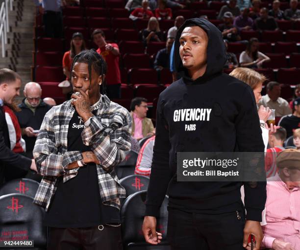 Travis Scott and Deshaun Watson before the game between the Houston Rockets and the Portland Trail Blazers on April 5, 2018 at the Toyota Center in...