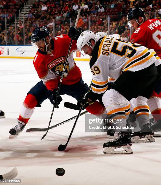 Vincent Trocheck of the Florida Panthers faces off against Tim Schaller of the Boston Bruins at the BB&T Center on April 5, 2018 in Sunrise, Florida.