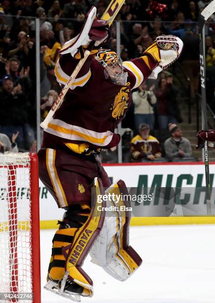 Hunter Shepard of the Minnesota-Duluth Bulldogs celebrates the 2-1 win over the Ohio State Buckeyes during the semifinals of the 2018 NCAA Division I...