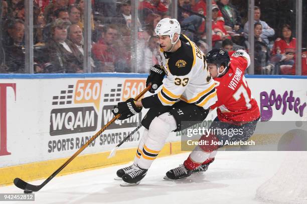 Frank Vatrano of the Florida Panthers pursues Zdeno Chara of the Boston Bruins as he skates with the puck during first period action at the BB&T...