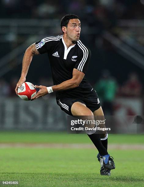 Zar Lawrence of New Zealand runs with the ball during the IRB Sevens tournament at the Dubai Sevens Stadium on December 5, 2009 in Dubai, United Arab...