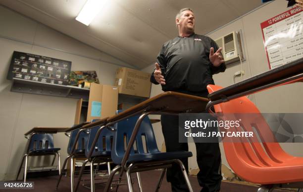 Scott Teel talks about his classroom in a portable building in Moore, Oklahoma on April 4, 2018. Buoyed by a nine-day strike in West Virginia which...