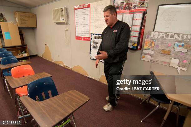 Scott Teel talks about his classroom in a portable building in Moore, Oklahoma on April 4, 2018. Buoyed by a nine-day strike in West Virginia which...