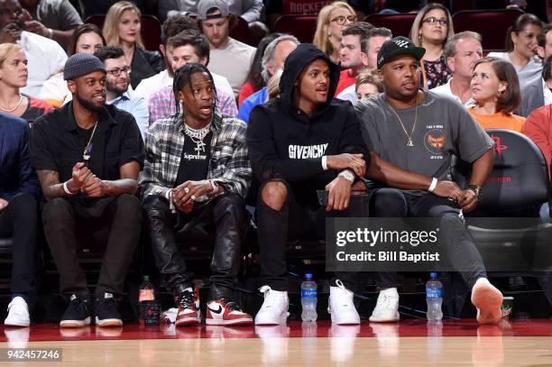 Travis Scott and Deshaun Watson during the game between the Houston Rockets and the Portland Trail Blazers on April 5, 2018 at the Toyota Center in...