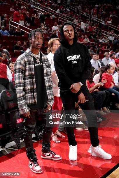 Travis Scott and Deshaun Watson before the game between the Houston Rockets and the Portland Trail Blazers on April 5, 2018 at the Toyota Center in...