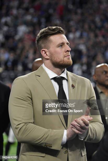 Watt with the Walter Payton Man of the Year Award on the field prior to the start of Super Bowl LII between the Philadelphia Eagles and New England...