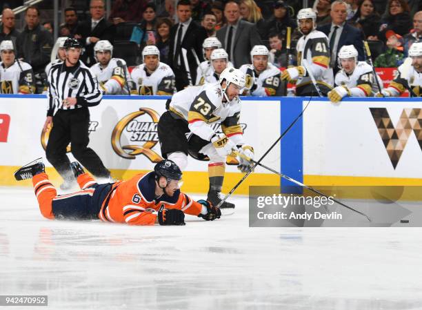 Adam Larsson of the Edmonton Oilers battles for the puck against Brandon Pirri of the Vegas Golden Knights on April 5, 2018 at Rogers Place in...