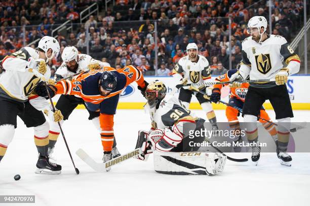 Zack Kassian of the Edmonton Oilers can't get the puck past goaltender Malcolm Subban of the Vegas Golden Knights at Rogers Place on April 5, 2018 in...
