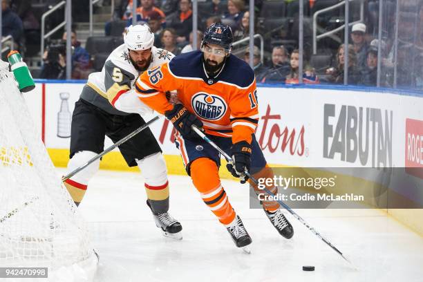 Jujhar Khaira of the Edmonton Oilers is pursued by Deryk Engelland of the Vegas Golden Knights at Rogers Place on April 5, 2018 in Edmonton, Canada.