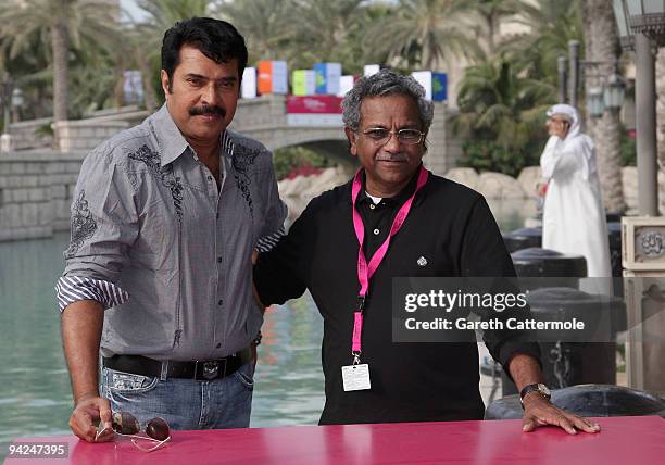 Actor Mammootty and director Shaji N Karun attend the "Kutty Srank" photocall during day two of the 6th Annual Dubai International Film Festival held...