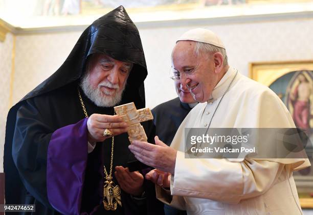Pope Francis exchanges gifts with Patriarch Aram I at the Apostolic Palace on April 5, 2018 in Vatican City, Vatican. Following the meetings, the...