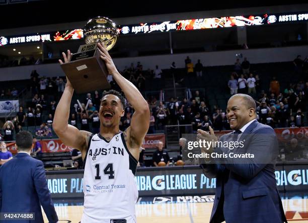 Nick Johnson of the Austin Spurs receives the Western Conference Champion trophy after the game against the South Bay Lakers during the Conference...