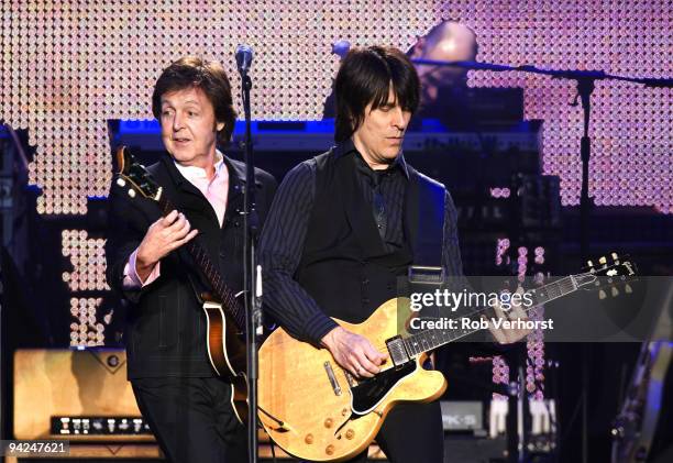 Paul McCartney and Rusty Anderson perform on stage at the Gelredome on December 9, 2009 in Arnhem, Netherlands.