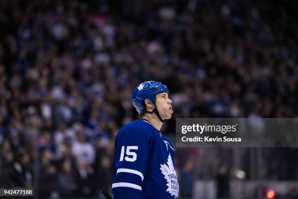 Matt Martin of the Toronto Maple Leafs looks up to the scoreboard at an NHL game against the Buffalo Sabres during the second period at the Air...