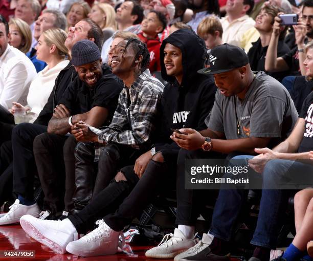 Travis Scott and Deshaun Watson during the game between the Houston Rockets and the Portland Trail Blazers on April 5, 2018 at the Toyota Center in...