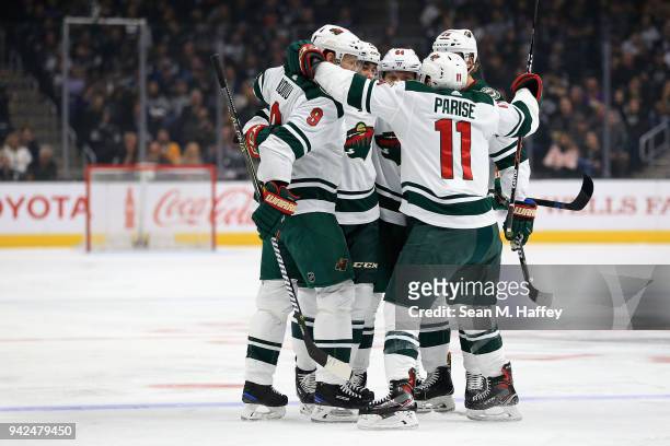 Zach Parise and Mikko Koivu after a goal by Nino Niederreiter of the Minnesota Wild during the first period of a game against the Los Angeles Kings...