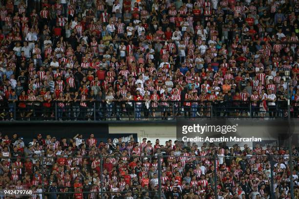 Fans of Estudiantes cheer for their team during a match between Estudiantes and Santos as part of Copa CONMEBOL Libertadores 2018 at Estadio...