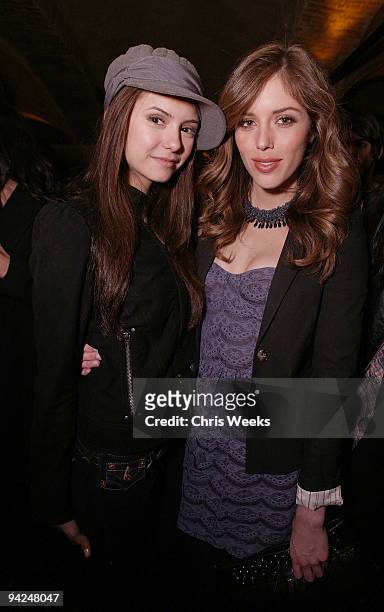 Actors Nina Dobrev and Kayla Ewell attends the NYLON Guys + AllSaints Holiday Issue Launch and Thirty Seconds to Mars record release party at The...