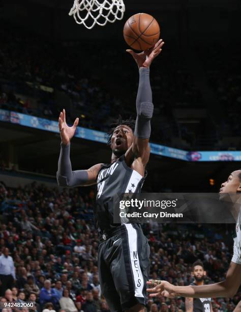 Rondae Hollis-Jefferson of the Brooklyn Nets dunks against the Milwaukee Bucks on April 5, 2018 at the BMO Harris Bradley Center in Milwaukee,...