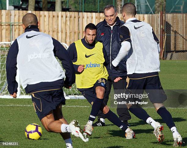 Manager, Avram Grant watches his players during a Portsmouth FC training session at their Eastleigh training ground on December 10, 2009 in...