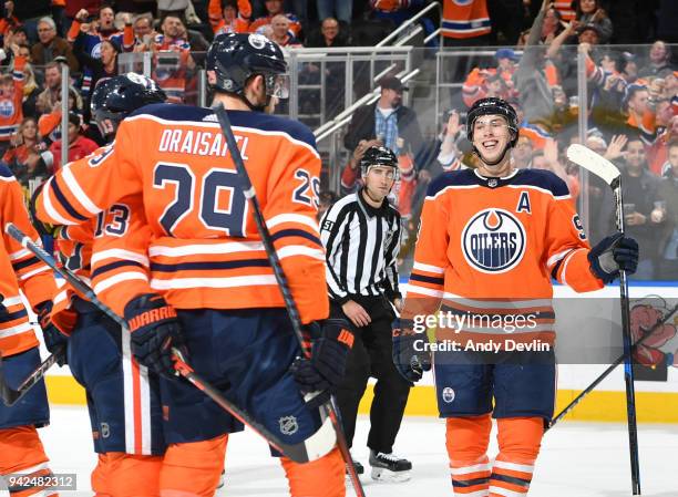 Ryan Nugent-Hopkins, Michael Cammalleri and Leon Draisaitl of the Edmonton Oilers celebrate after a goal during the game against the Vegas Golden...