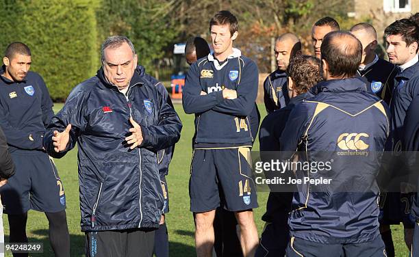 Manager, Avram Grant speaks with the players during a Portsmouth FC training session at their Eastleigh training ground on December 10, 2009 in...