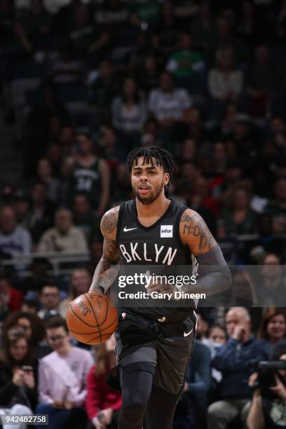 Angelo Russell of the Brooklyn Nets brings the ball up court against the Milwaukee Bucks on April 5, 2018 at the BMO Harris Bradley Center in...