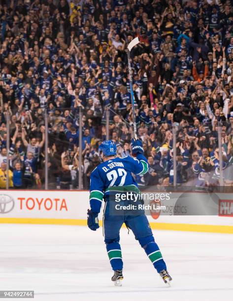 Daniel Sedin of the Vancouver Canucks celebrates after scoring the game winning goal in overtime against the Arizona Coyotes in NHL action on April...