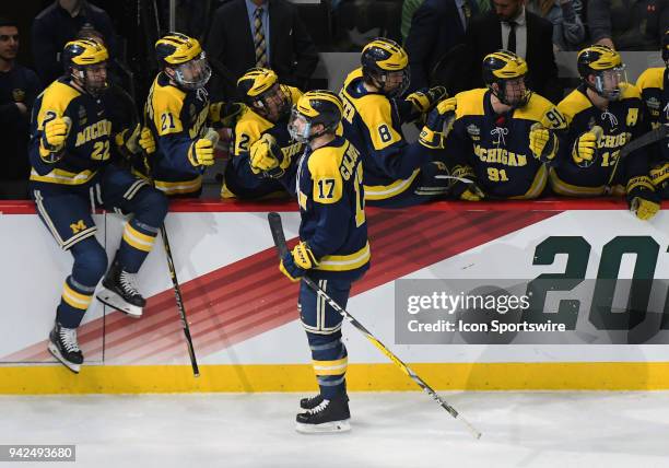 Michigan Wolverines forward Tony Calderone celebrates his 1st period goal during a Frozen Four Semifinal between the University of Michigan and Notre...